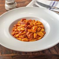 Cavatelli alla Salsiccia · Slow-cooked hot sausage and bell pepper ragu with homemade cavatelli.