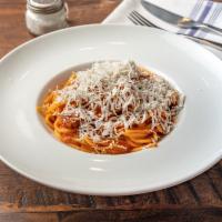 Spaghetti · Served with eggplant ragu and ricotta salata.