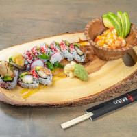 Monster Lobster Roll · Lobster tempura, spicy tuna, spring mix, avocado, tobiko. Served with rock shrimp bits, spic...