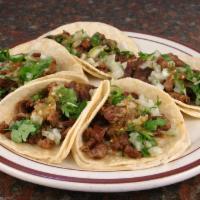 3. Five Tacos · Choice of meat, onions, cilantro, salsa.