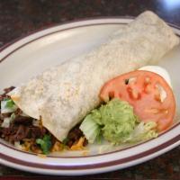 #5. Burrito · Choice of meat, onions, cilantro, salsa, rice, beans wrapped with a flour tortilla.