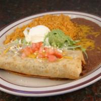 7. Chimichanga · Deep fried burrito, choice of meat, cheese, rice, beans, tomato, sour cream, guacamole.