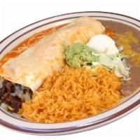 6. Burrito Plate · Wet burrito, choice of meat, onions, cilantro, salsa, rice, beans, cheese, sour cream and gu...