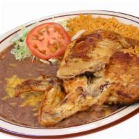 Pollo Asado · Served with rice, beans, salad and tortillas.