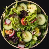 Garden Salad · Romaine, cilantro, cucumbers, red onions, tomatoes, mushrooms, croutons, avocado, cotija che...