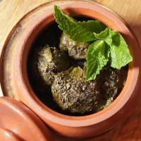 Dolma · 10 pieces. Young leaves of the grapevine stuffed with ground beef.