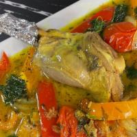 Lamb Shank · Lamb shanks are slowly simmered with fresh rosemary, garlic, tomatoes, onions.