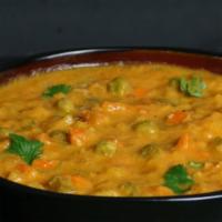 8. Vegetable Korma · A medley of fresh vegetables cooked in almond gravy.