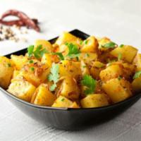 9. Marwari Jeera Aloo · Baby potatoes cooked in cumin, seeds, asafoetida, and fresh cilantro with mild spices. Vegan.