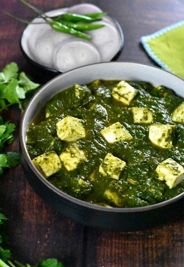 12. Saag Paneer · Homemade cottage cheese cooked with fresh spinach, spices, and tomatoes.
