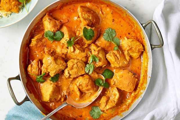 2. Chicken Curry · Cubes of boneless chicken simmered in a gravy of roasted spices.