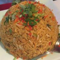 1. Chicken Biryani · Chicken cooked in rice and aromatic spices, served with raita.