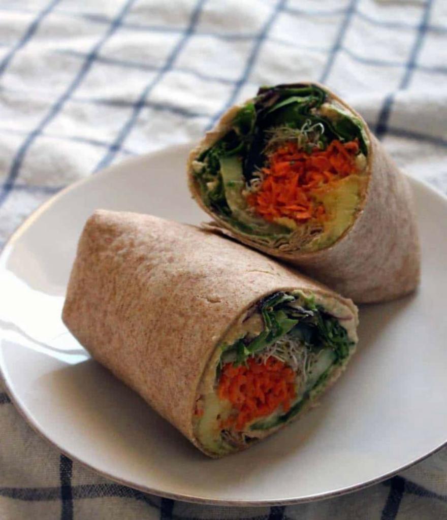 2. Vegetarian Wrap · Green zucchini, yellow squash, red, yellow and green peppers, olives with hummus and olive oil.
