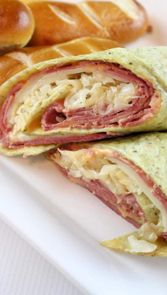 9. The Peloton Wrap · Hot pastrami with melted Swiss cheese, coleslaw, with Russian dressing.