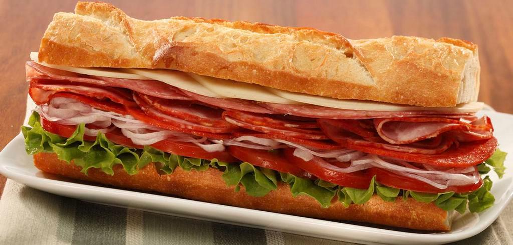 2. Sweet Village · Han, salami, provolone cheese with lettuce and tomato.