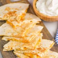 13. Cheese Quesadilla · Cooked tortilla that is filled with cheese and folded in half. 