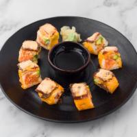 Tickle Me Tuna Roll · Spicy tuna, avocado with soybean wrap, topped with seared pepper tuna, sweet and spicy sauce.