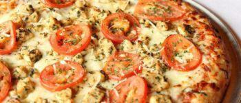 The Classic Pizza · Roasted chicken, fresh tomatoes, fresh basil, fresh garlic, virgin olive oil and mozzarella.