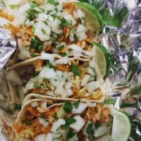 Main Street Tacos · Chicken, beef or steak with spicy slaw, onion cilantro mix and creamy guacamole.