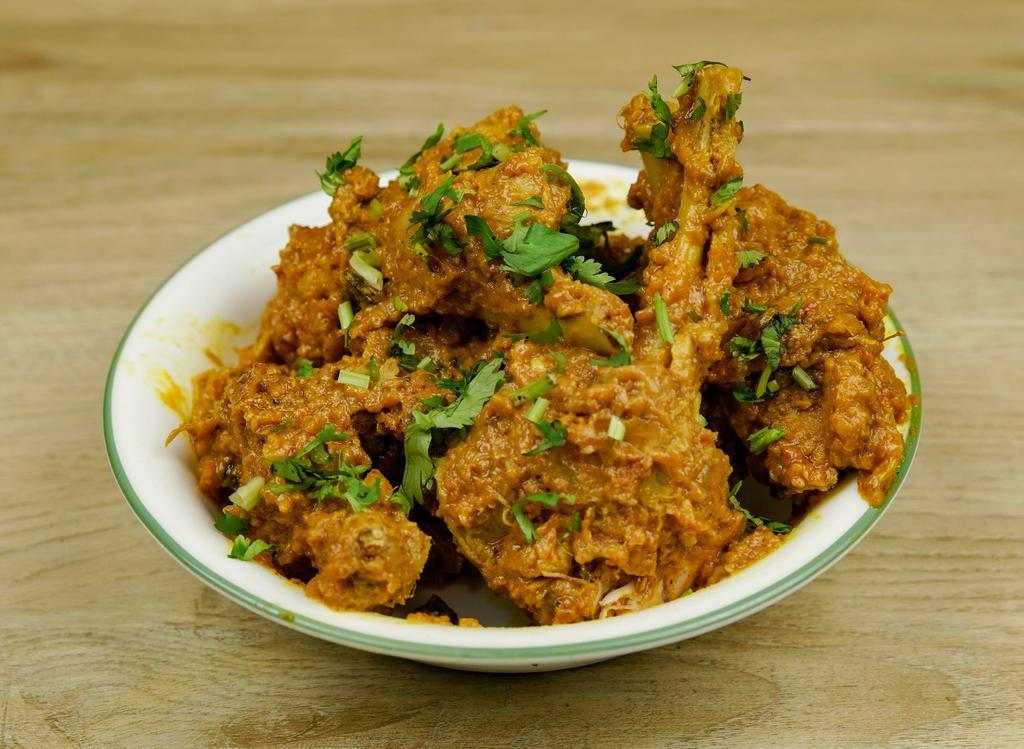 Chicken Curry · Chicken prepared with tomatoes, herbs, and spices.