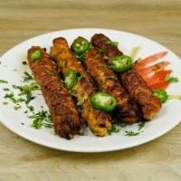 Chicken Sheesh Kabab Specialty · Minced chicken, marinated in tremendously delicious spices and herbs.