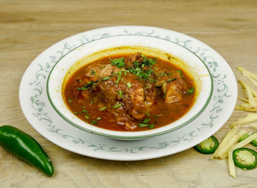 Goat Paya · Goat feet, cooked in a very thick gravy, served with fresh coriander and green chilies.