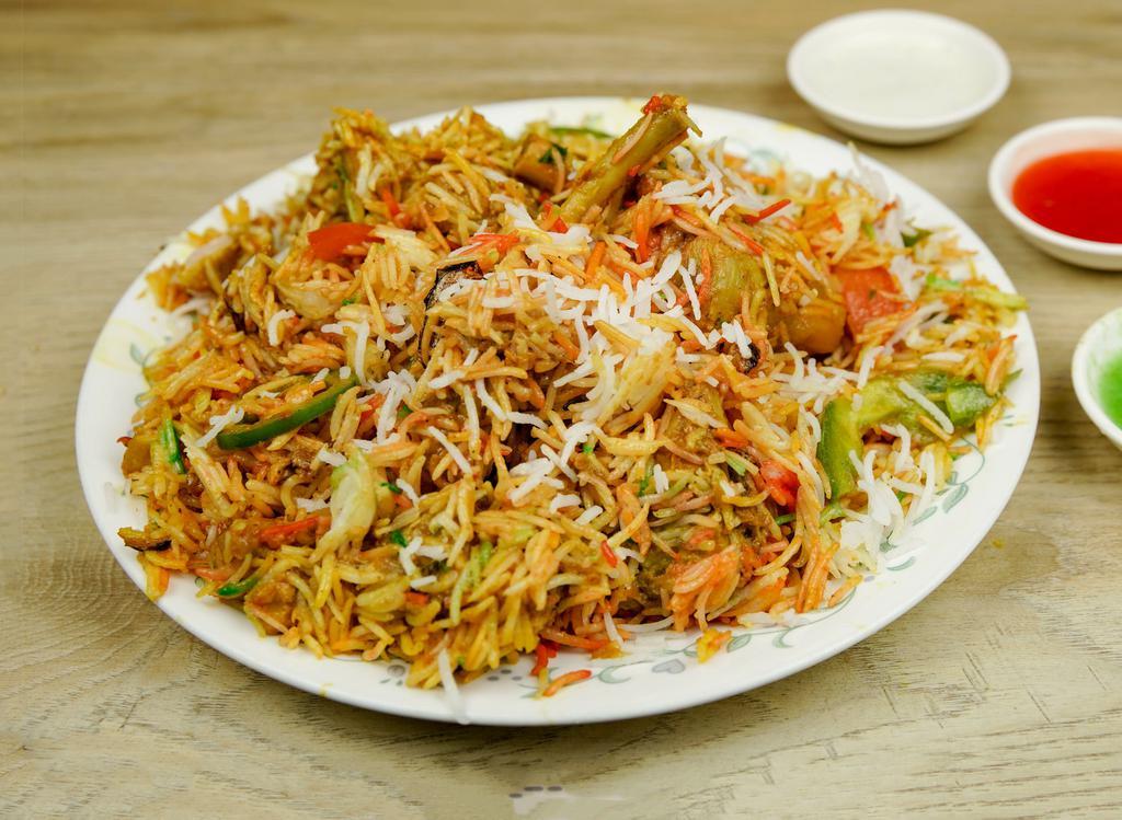 Chicken Biryani · Basmati rice cooked with delicious chicken, herbs, and spices.
