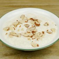 Kheer  · Per serving. Rice pudding with almonds topping.