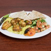 Large Chicken Shish Kebab · Tender chunks of chicken marinated with chef's blend of herbs and spices.