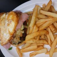 Cuban Burger · Roasted Pork Shoulder, Swiss Cheese, Ham, Lettuce, Tomatoes, Sunny Side Egg