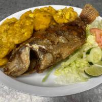 Tilapia Roja lunch · Fried red tilapia.served w/rice and beans,mashed potato,french fries,tostones