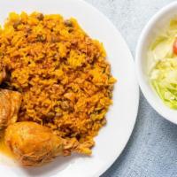 Stewed Chicken Combo · Served with your choice of rice and a side salad.