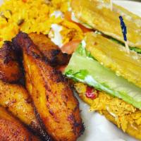 Jibarito Chicken · Fried plantain sandwich chicken includes mayo, lettuce, tomato, garlic sauce Served with arr...