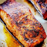 Blackened Salmon · Seasoned salmon filet grilled blackened