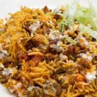 Chicken and Lamb over rice · With rice and  mixed green salad 
white sauce and hot sauce 
 if you don't like any of the s...