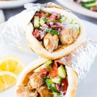 Chicken  or lamb  Gyro  with fries and can soda · With fries and can of soda.
 gyro comes with mixed green salad and White sauce.Please mentio...