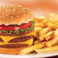 Double Cheeseburger Deluxe · Lettuce, tomato and mayo.
 French fries . curly fries .  onion rings .