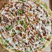 24. BLT Pizza · Grilled chicken, lettuce, tomatoes, onions, bacon and ranch dressing.