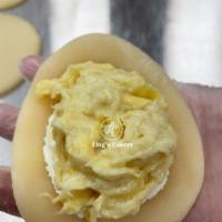 Durian Mochi · 3 pieces. Fresh handmade mochi with durian and whipped cream. Creamy from the inside chewy a...