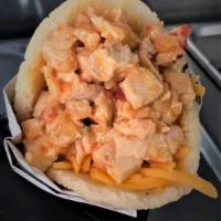 Arepa Chicken · Pieces of chicken cooked and seasoned with our homemade marinade. Comes with cheddar.