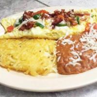 Omelette · 2 eggs with cheese and beans.
