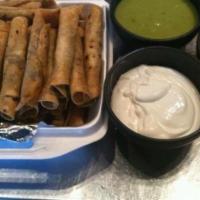 6 Flautas · Served with avocado sauce and sour cream.