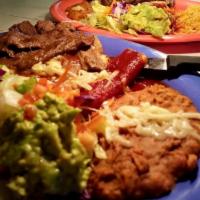 Toreados, Combination Plate · Steak, chiles rellenos, enchilada, guacamole, rice and beans.