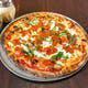 Chicken Parm Pizza · Tomato sauce, mozzarella, fried chicken cutlet, ricotta, and basil.