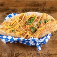 Quesadilla · 10in flour tortilla, choice of protein, colby jack cheese, cilantro, spicy mayo