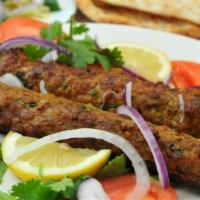 2 - Chicken Seekh Kabab - FULL SKEWERS · Mildly-Spiced minced chicken wrapped on skewer, roasted in clay oven.
Comes with chutney.