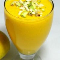 4 Mango Lassi  - *4 Glasses* · An delicious yogurt based drink with mango flavor.