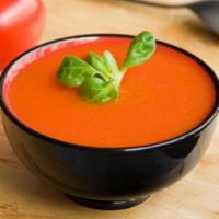 Tomato Soup · A tomato based soup prepared with spices.