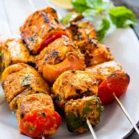Paneer Tikka - VEG · Cottage cheese sauteed with bell peppers & onion & roasted in clay oven.
