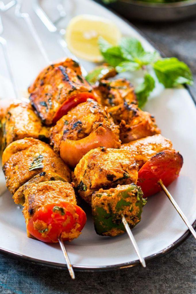Paneer Tikka - VEG · Cottage cheese sauteed with bell peppers & onion & roasted in clay oven.